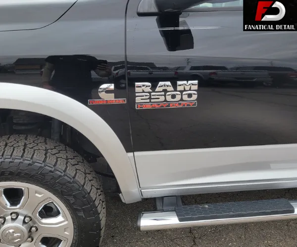 A close-up side view of the pickup truck’s front door and fender.
