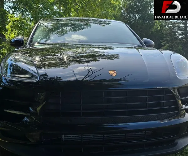 view of a dark sports car post-paint correction