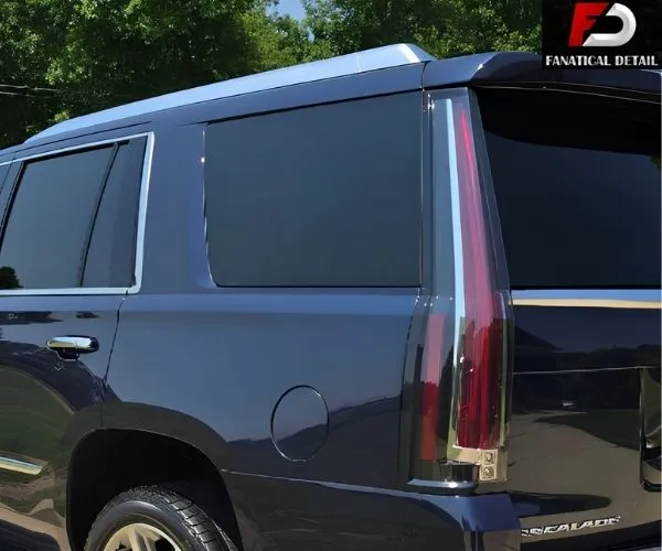 demonstrating window tinting service in Mid Michigan