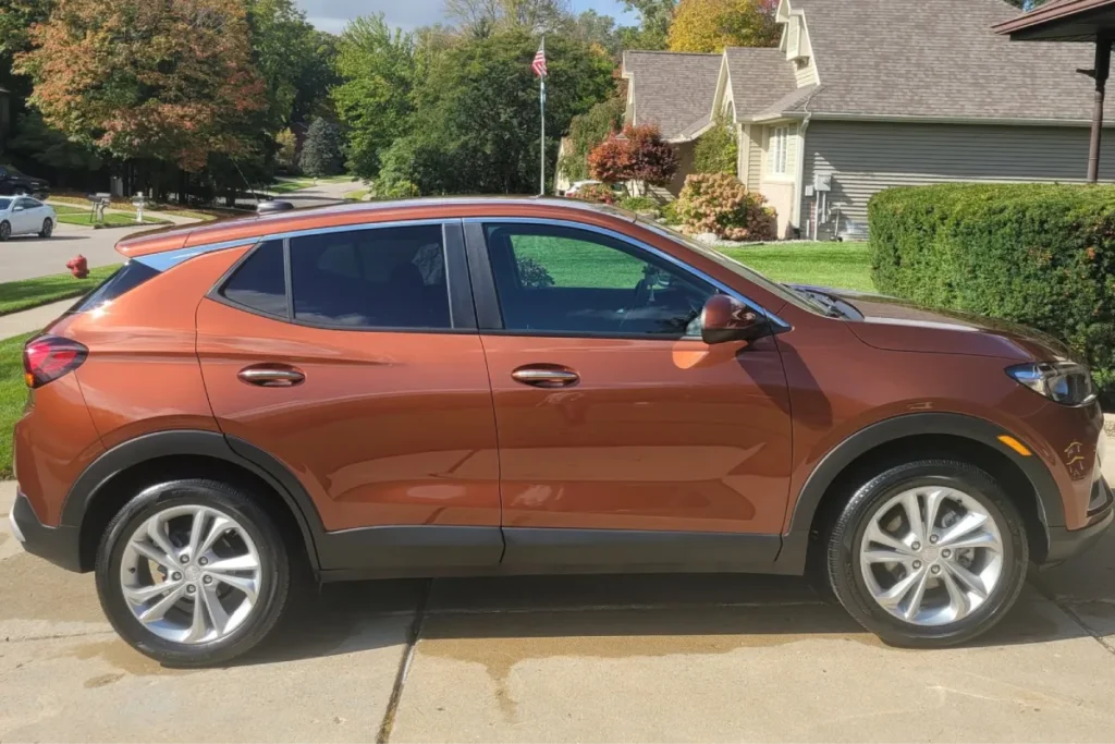 Orange SUV with a clean, polished finish after auto detailing.