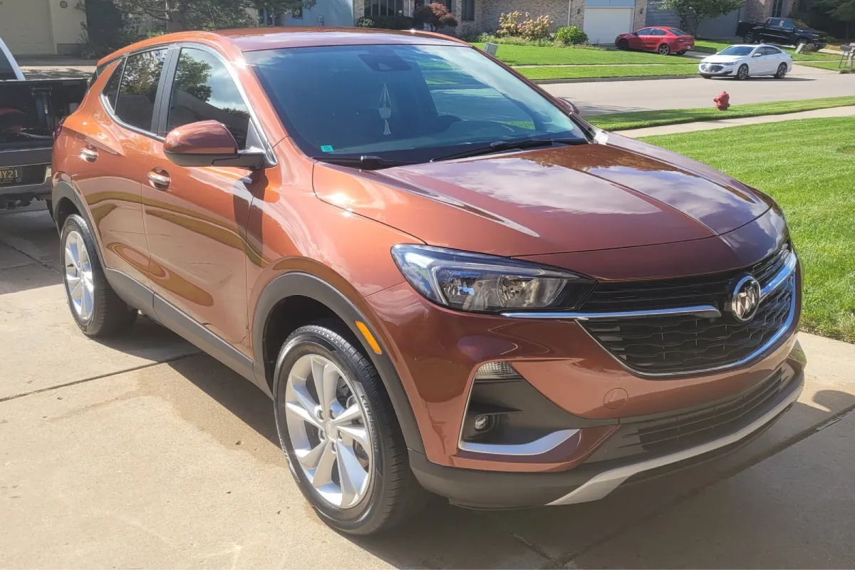 Detailed orange SUV with a glossy exterior finish.